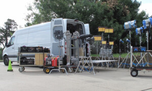 Image of white, 3-Ton Sprinter Van showing lights, gear and equipment. Gaffer. Lighting, Truck, Dallas