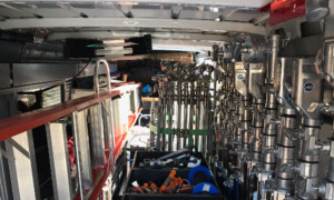 Picture showing inside of 3-ton Sprinter Van loaded with equipment and gear