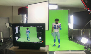 Location shot of Dallas Cowboy player with green screen background. Various lights and Chimeras are being used.